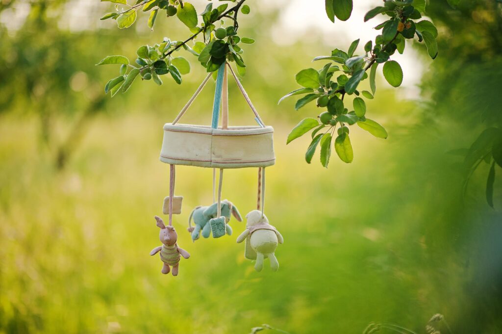 Winnie the Pooh Mobile hanging in a Tree